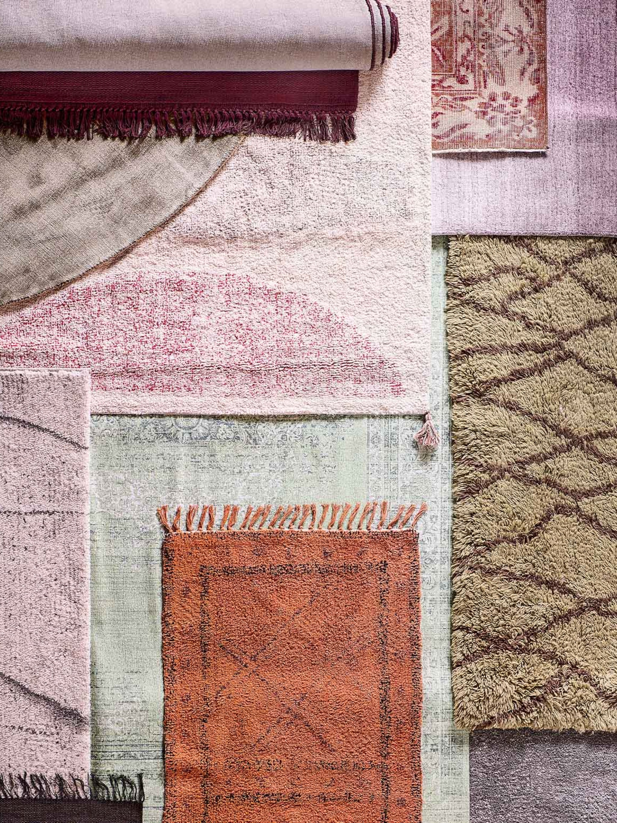 dit doen vloerkleden met verschillende vormen en kleuren voor een ruimte