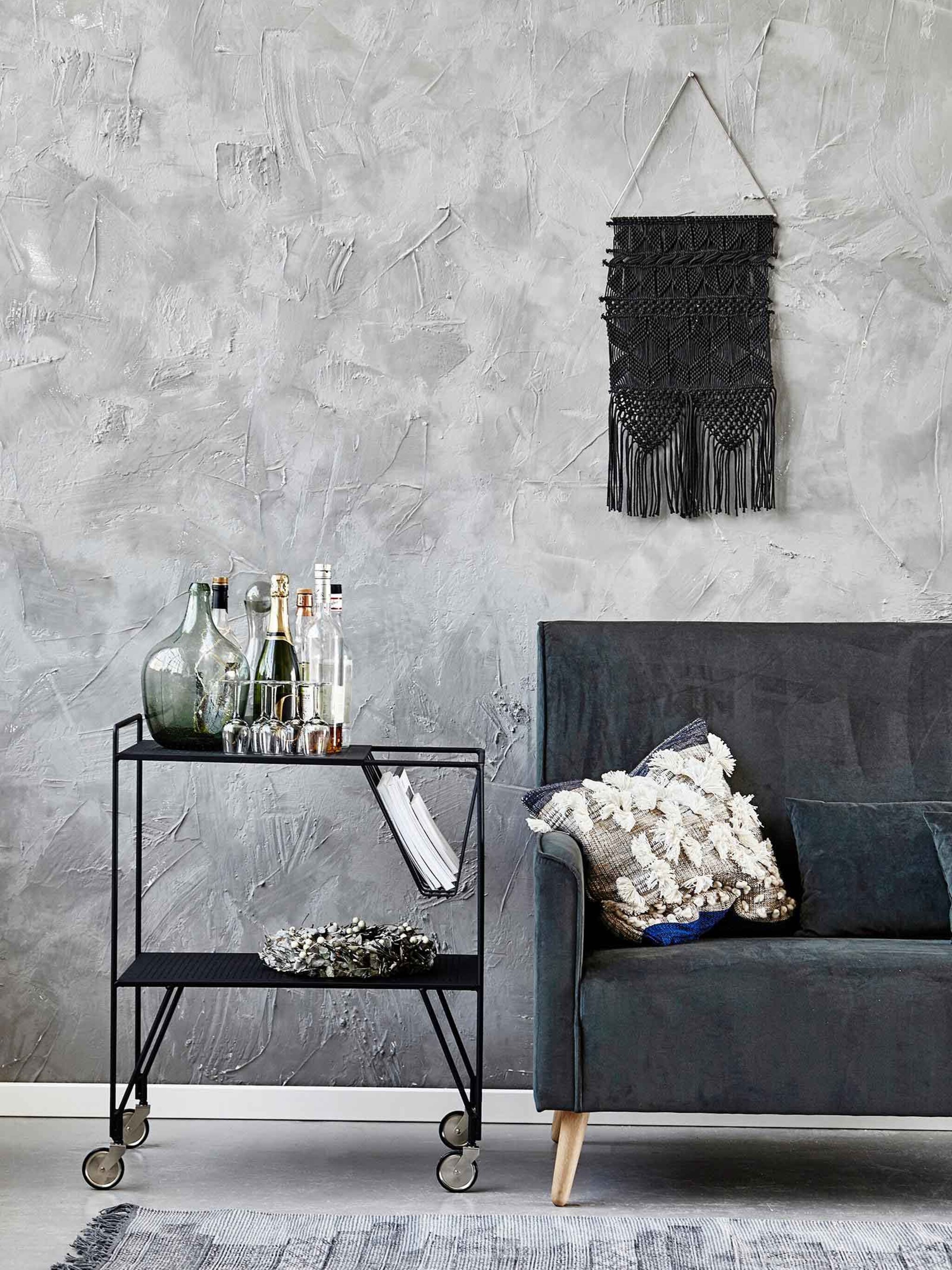 het vloerkleed het middel voor warme voeten en een fris interieur