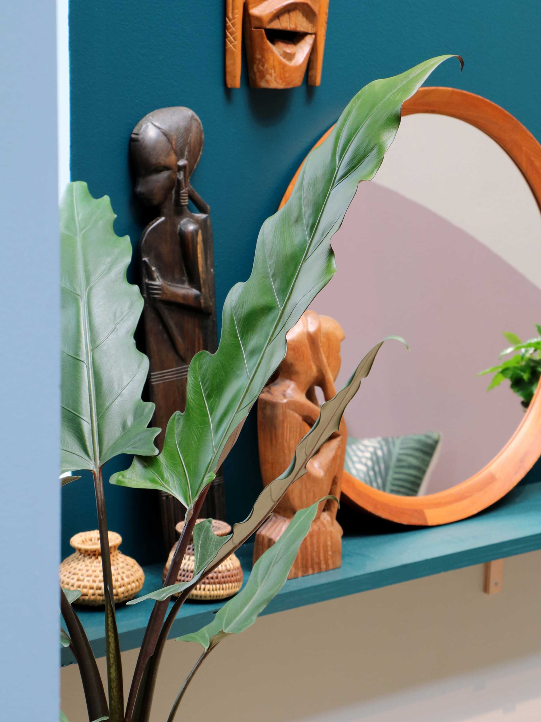 etnische slaapkamer met een botanische touch