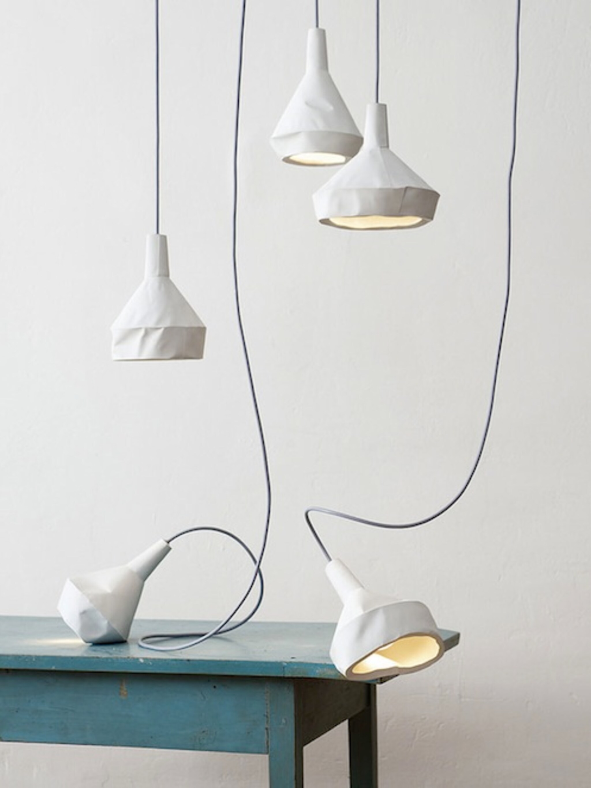 unieke lampen van beton en papier
