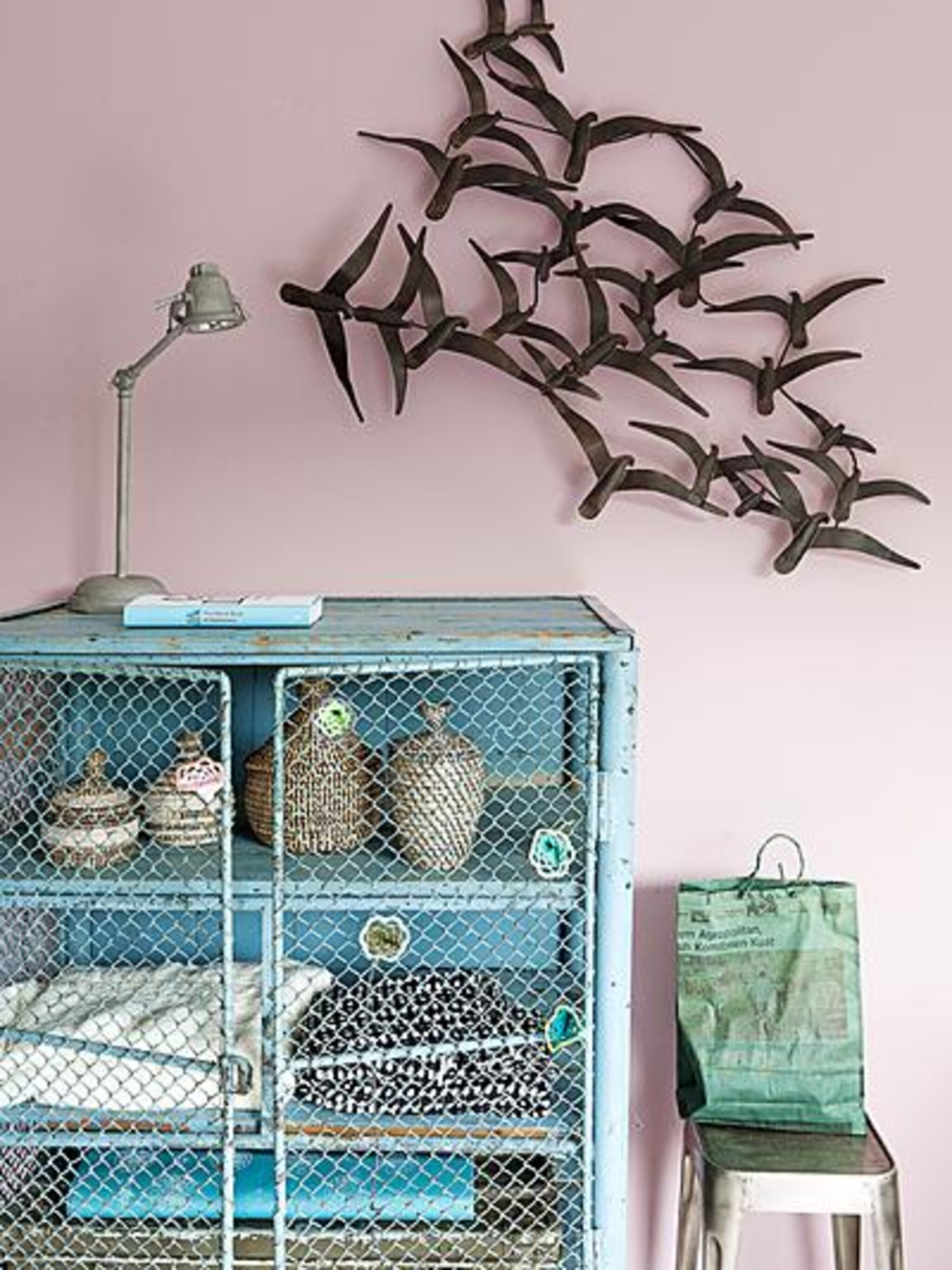 vogels aan de muur
