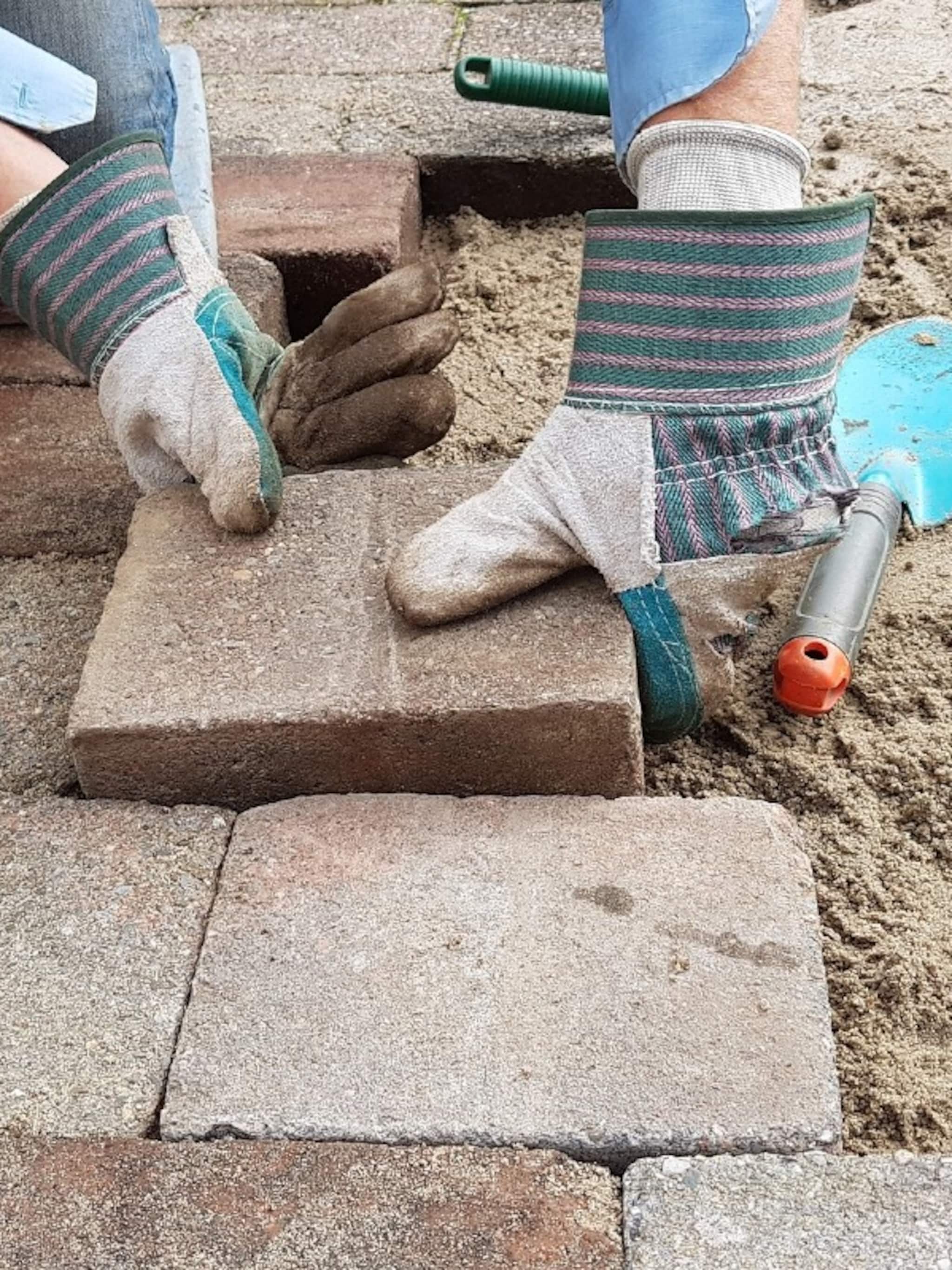 tuinbestrating met deze handige video s kun je zelf de tuin bestraten