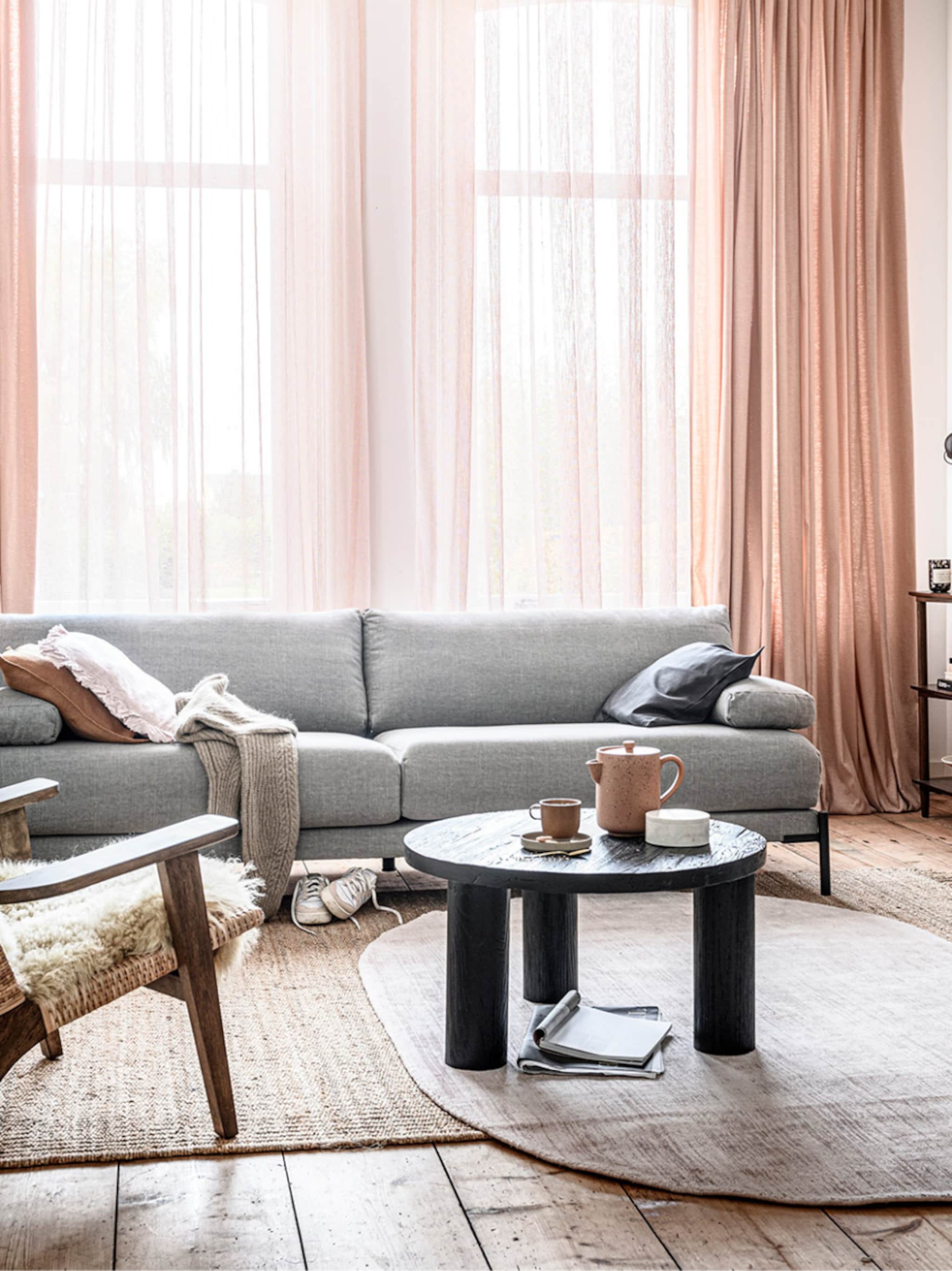 vorm en plaatsing voor een vloerkleed bij de bank