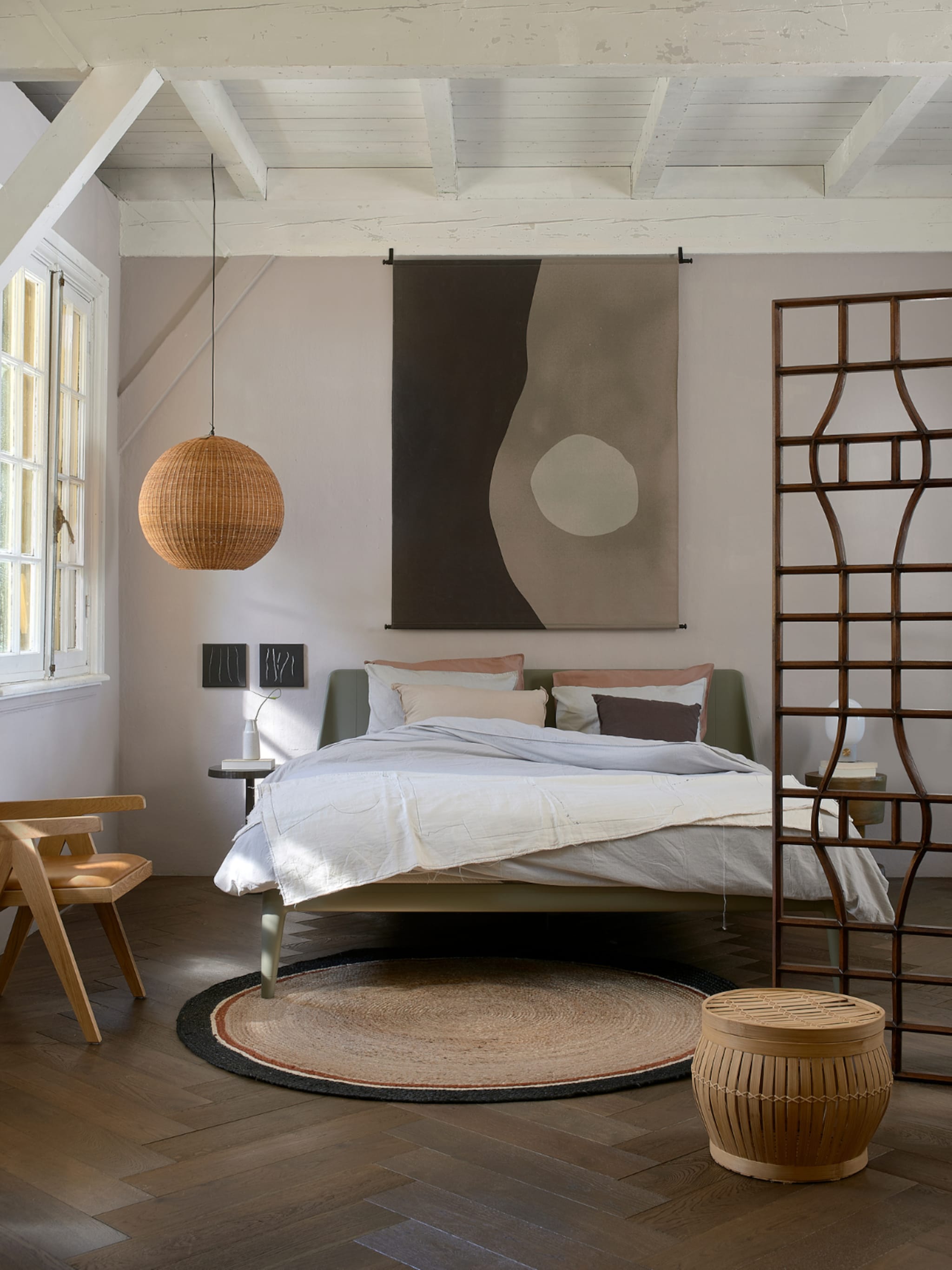 een wandkleed in de slaapkamer