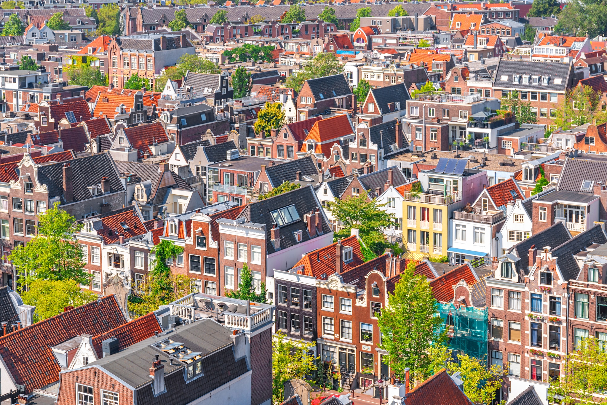 This is a high angle view above the city of Amsterdam. The photo was taken from the top of the Westerkerk bell tower, one of the highest points of the city. Getty Images