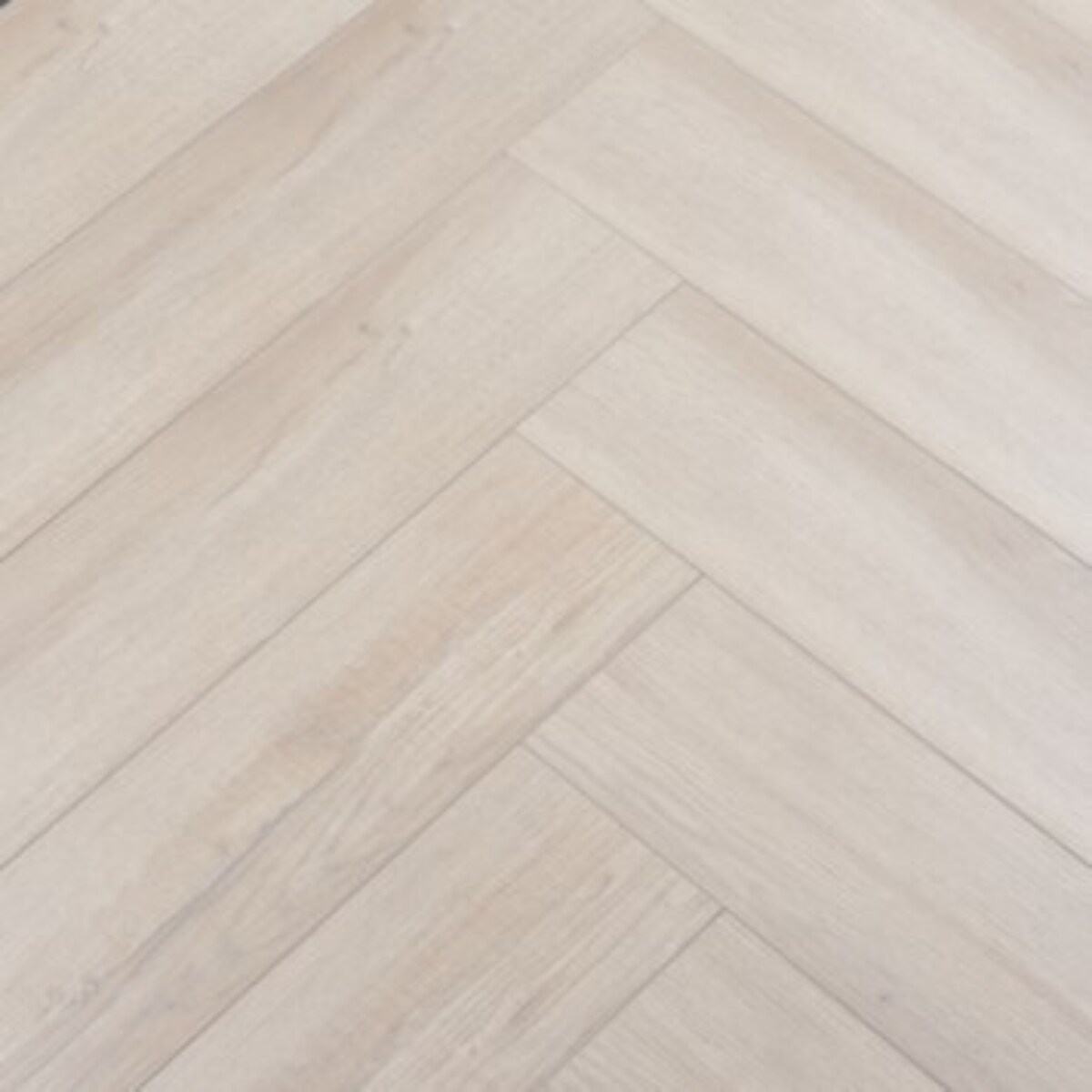 Laminaatvloer visgraat Board vergrijsd, lamel 65,5x13,3x0,8 cm, met groef, per m² € 34,99. vtwonen 01-2024 | productie Tanja Saarberg | styling Kim van Rossenberg | fotografie Sjoerd Eickmans/Peggy Janssen