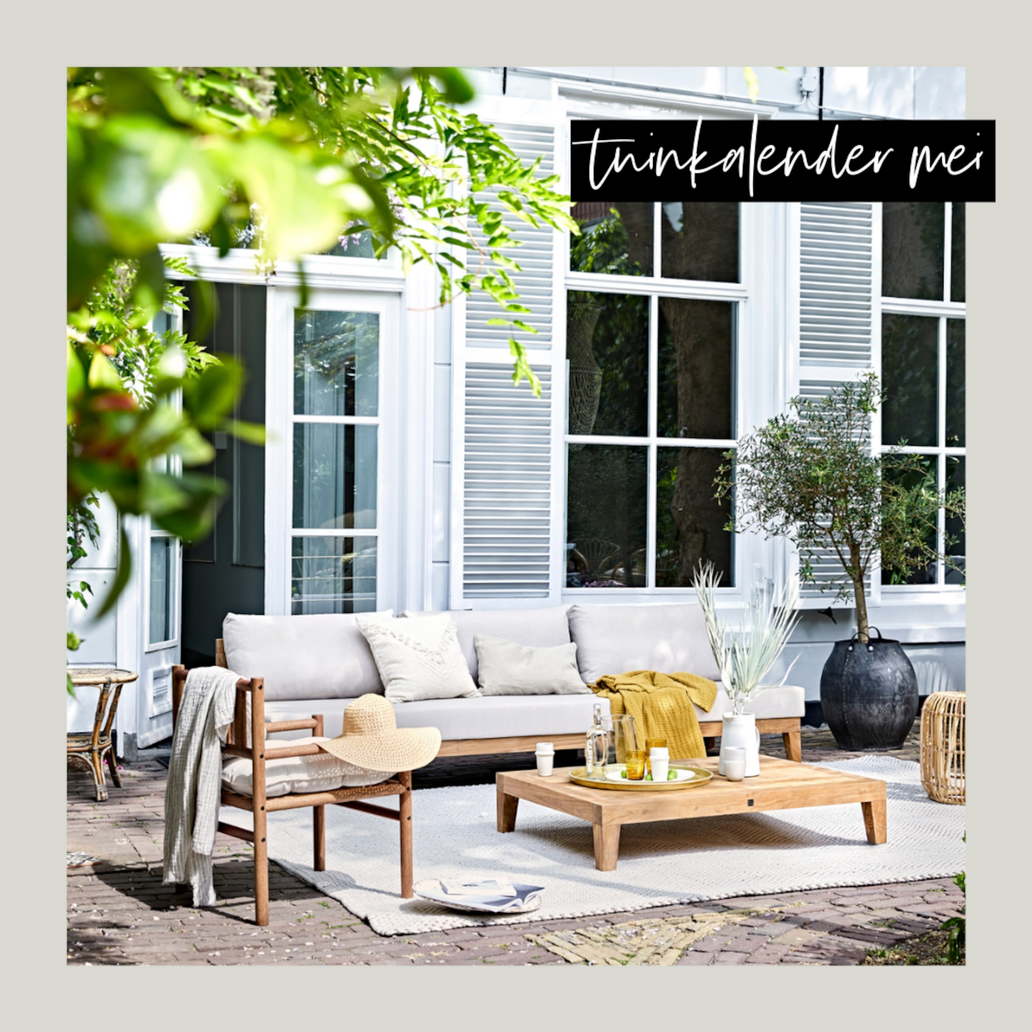 Tuin met loungeset en buitenkleed