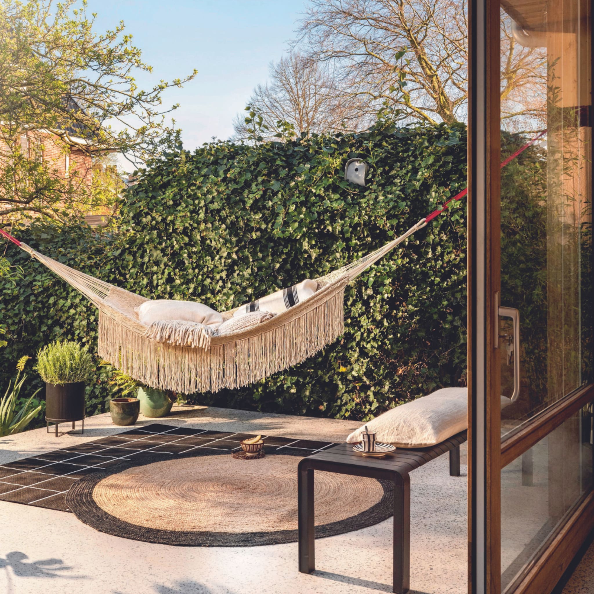 tuinmeubels shoppen hangstoel ligbed zomer