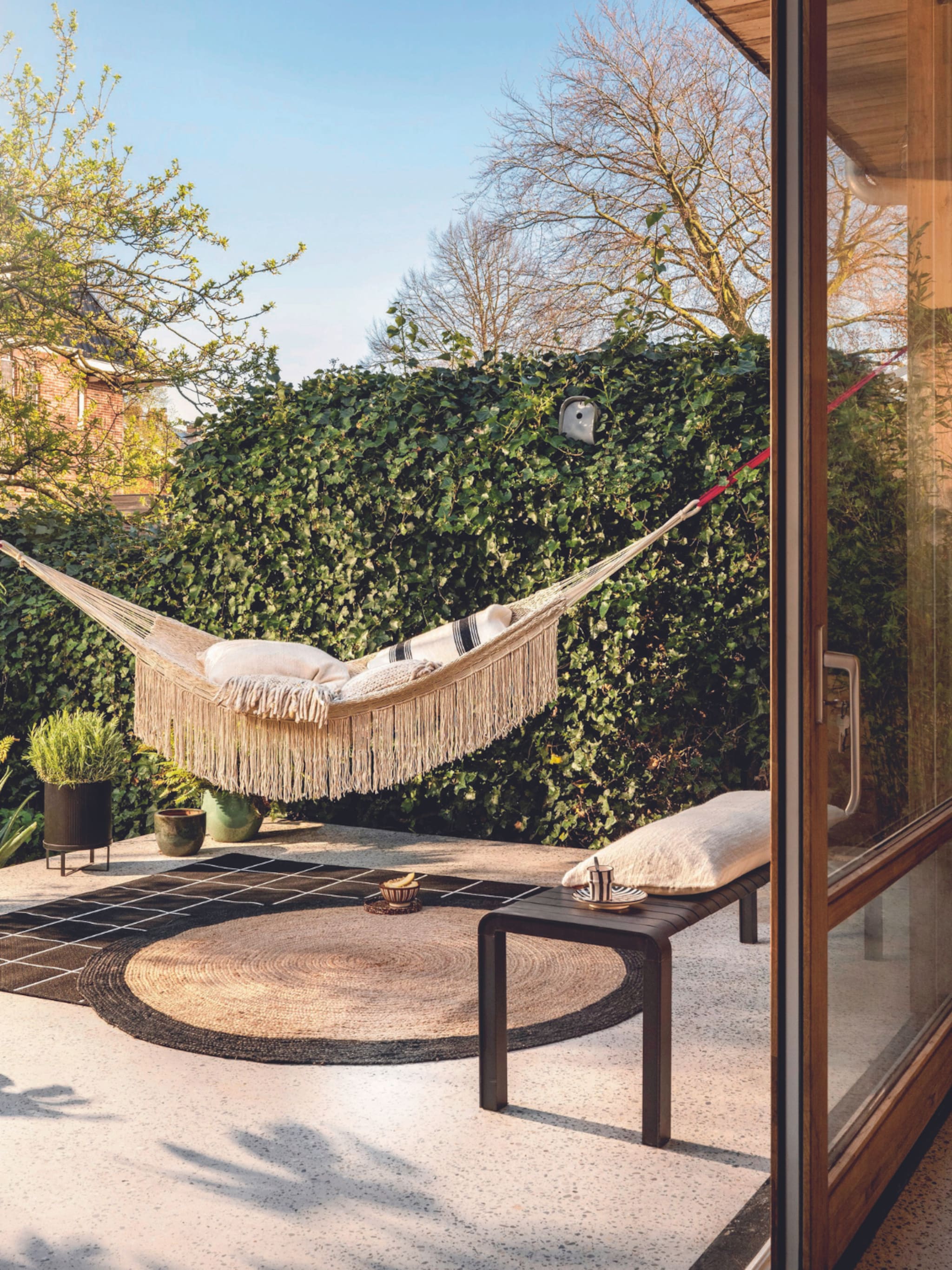 tuinmeubels shoppen hangstoel ligbed zomer