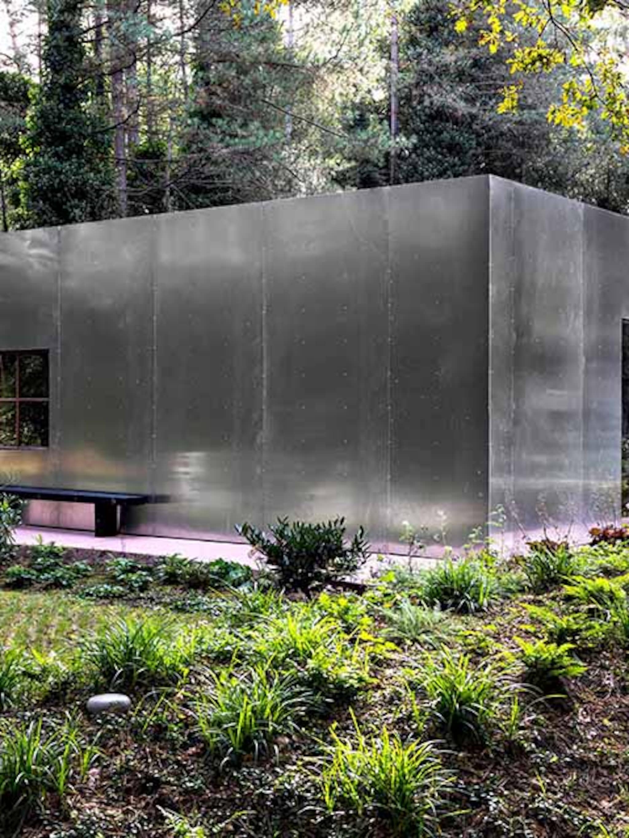 binnenkijken bungalow aluminium gevel roze terras