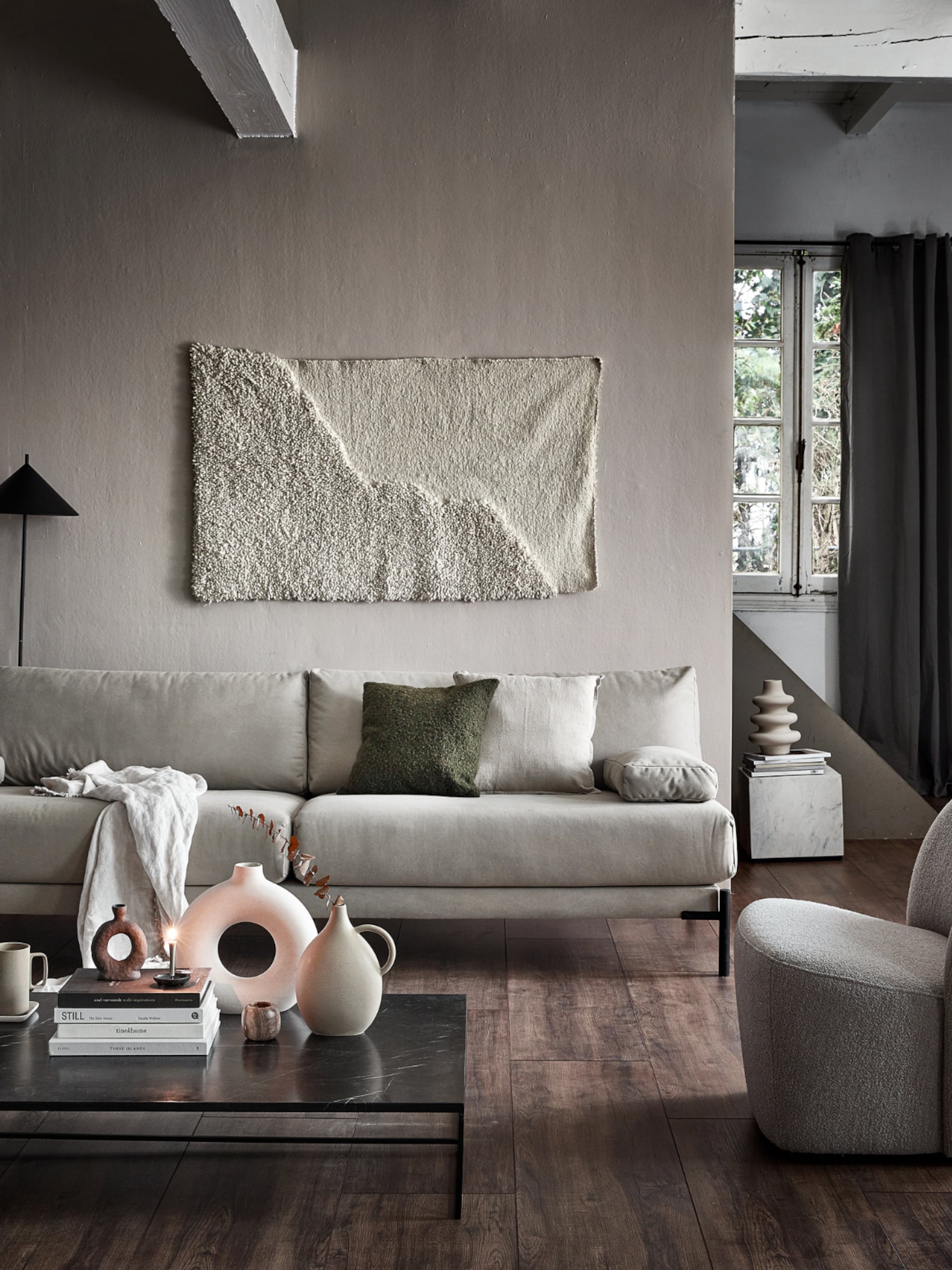 woonkamer aankleden met wandkleed