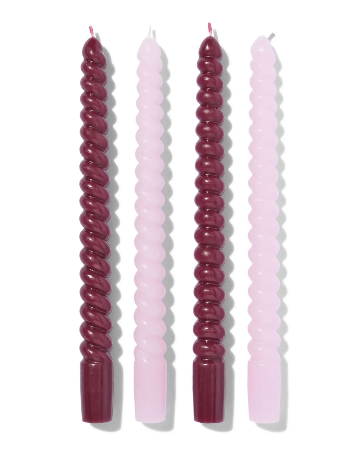 4 stuks kaarsen gedraaid, roze/rood, HEMA, € 3,99. HEMA