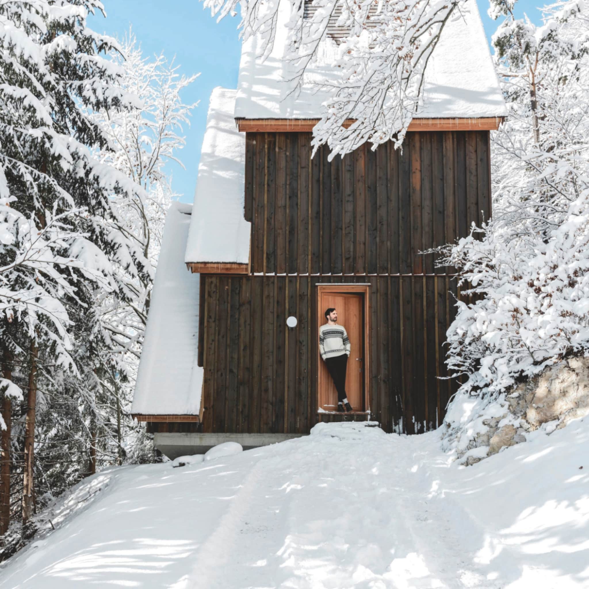 Houten woning in de Italiaanse Alpen