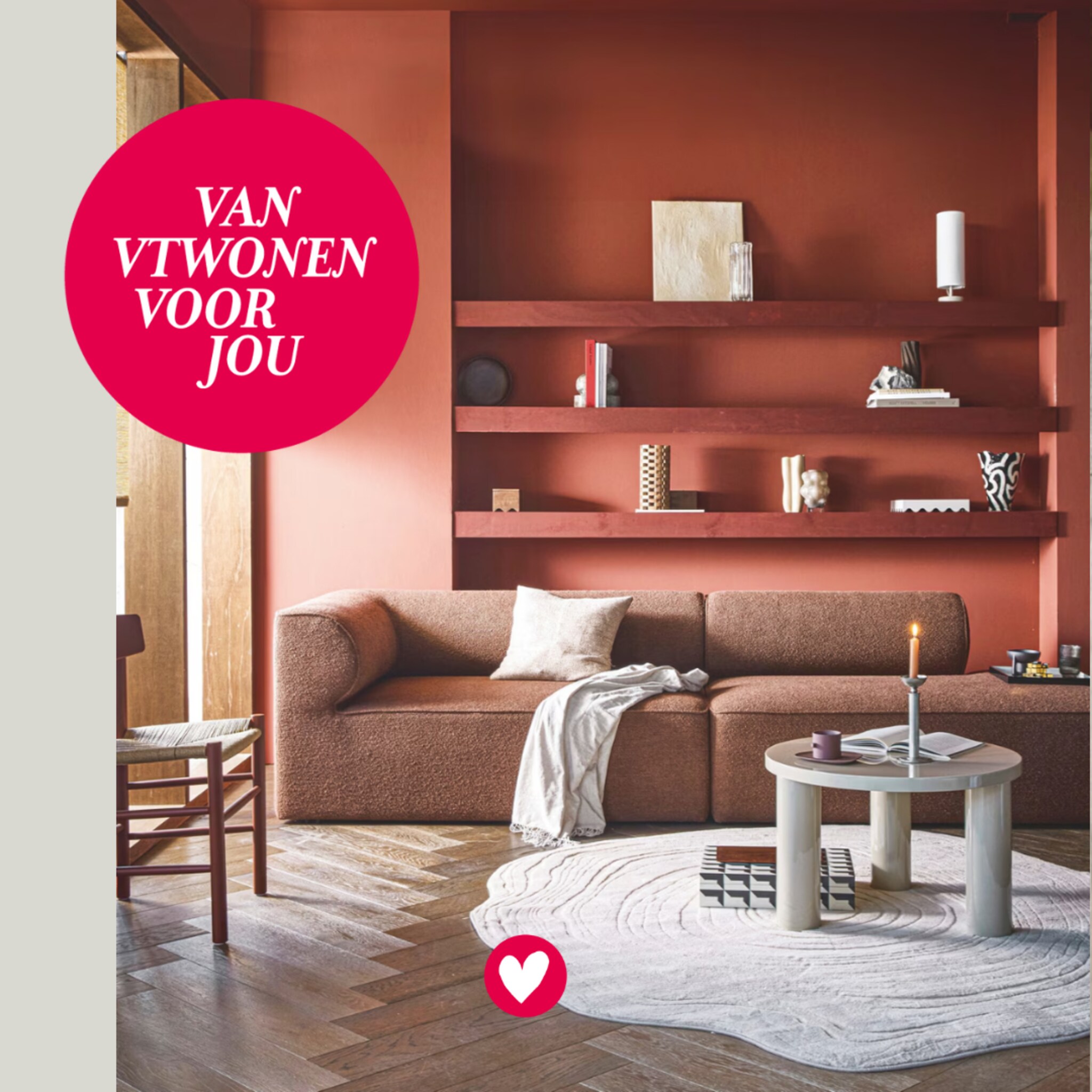 Woonkamer met een terra muur